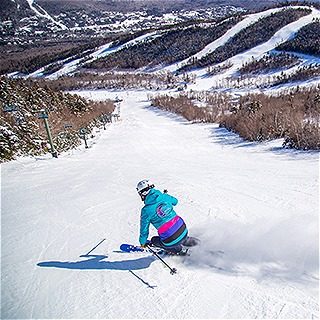 Woman Skiing at Waterville Valley