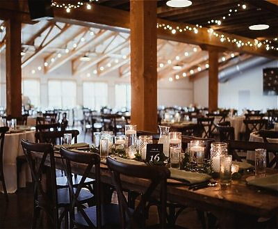 Romantic wedding reception setup with candlelight at Vennebu Hill near Wisconsin Dells
