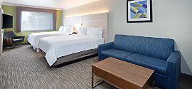 Watsonville CA hotel room with bed and sofa sleeper