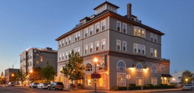 Majestic Inn & Spa exterior building at dusk