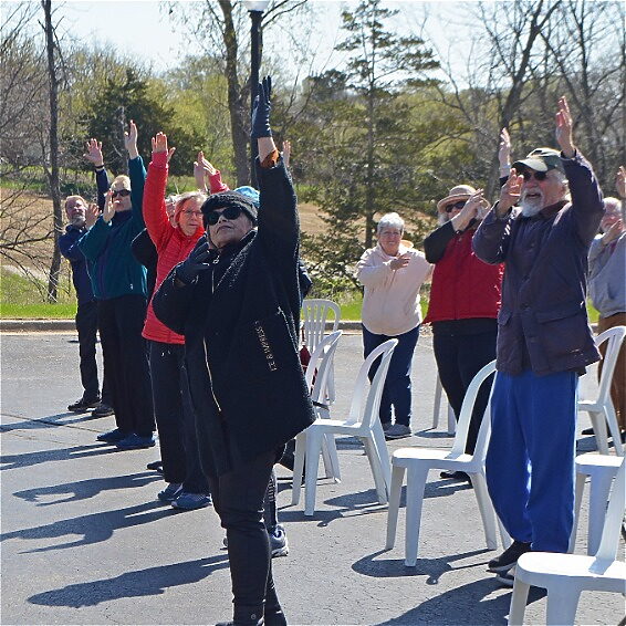 group participating in Tai Chi outdoors