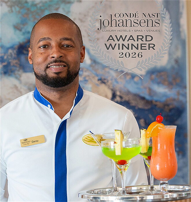 Man carrying tray of cocktails