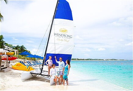 Family and sail boat