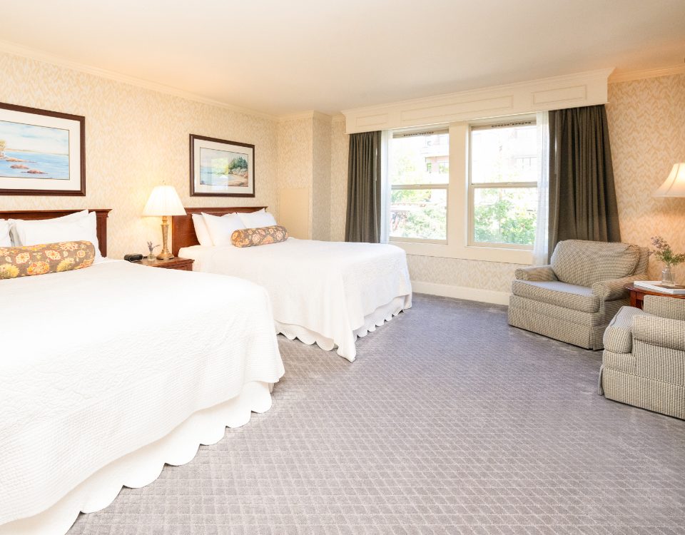 Parkside room with two queen beds and a sitting area