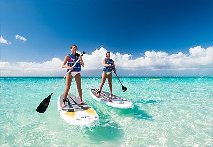 Two people paddleboarding