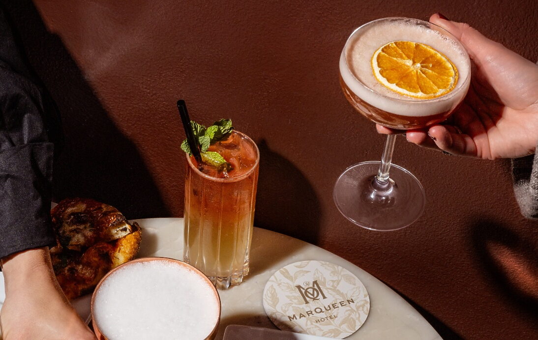 Cocktails and lounge seating at The Tin Lizzie Lounge at The MarQueen Hotel in Seattle’s Queen Anne neighborhood.