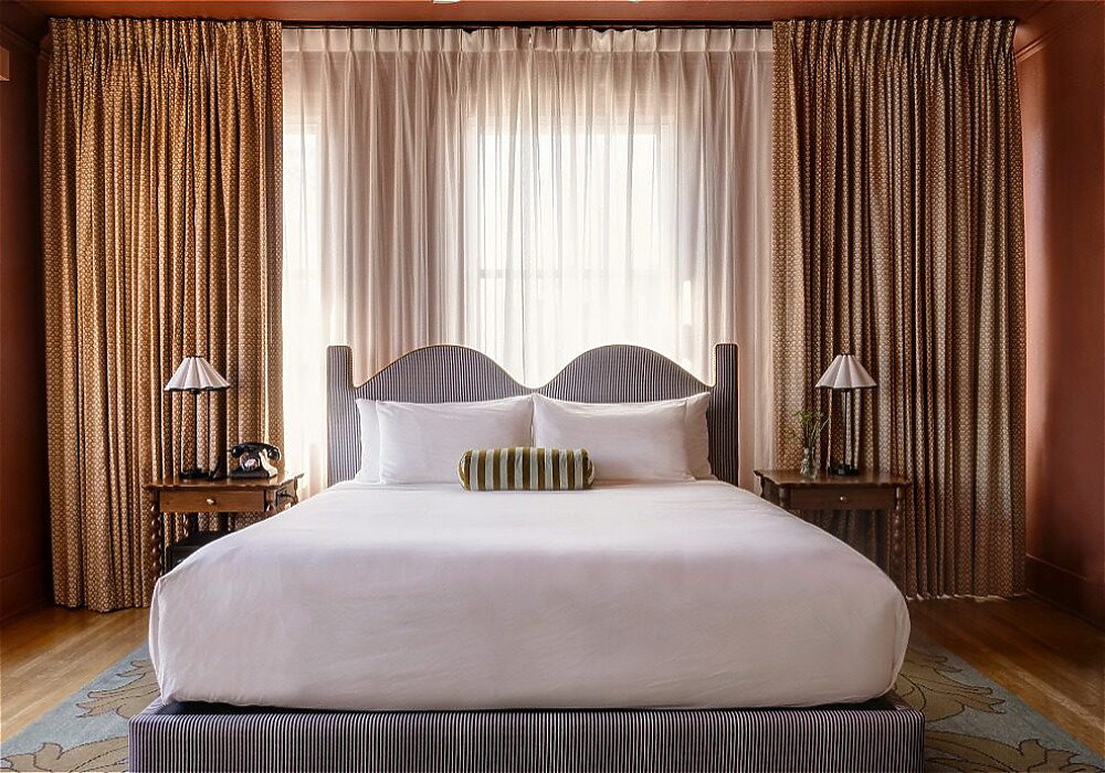 King size bed at MarQueen Hotel