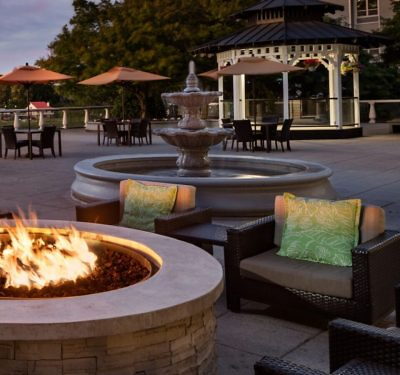 Fire pit with lounge chairs and fountain