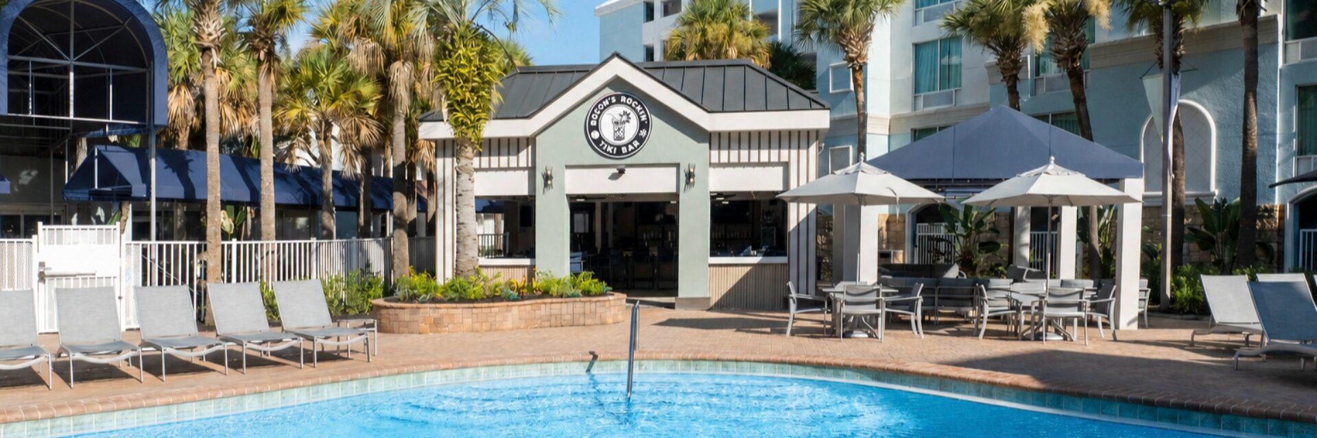 Hotel pool with tiki bar