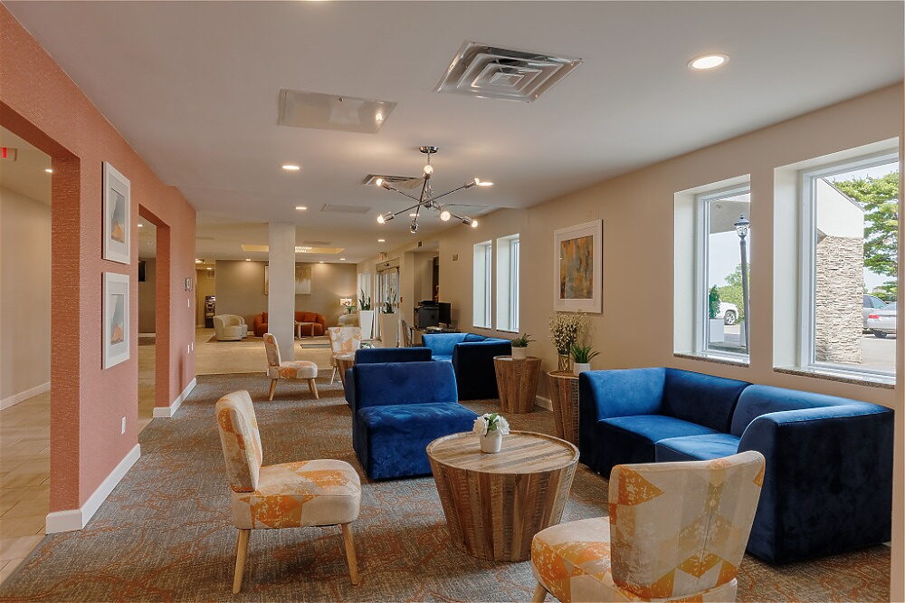 Hotel Lobby Seating Area at Orangewood Inn and Suites KCI Near Kansas City Airport